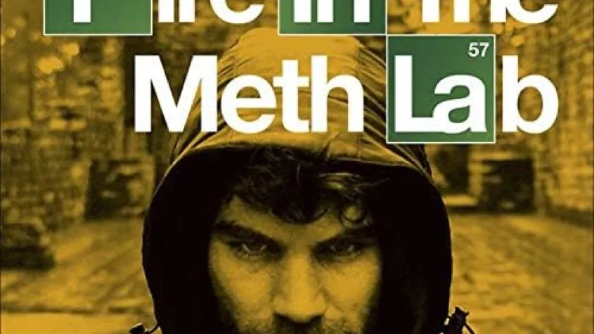 A man in a hoodie on a yellow background for Fire in the Meth Lab