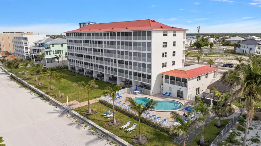 Pointe South condominium complex in Fort Myers Beach, Florida, featuring waterfront vacation rentals with easy access to the beach, nearby dining, and local attractions.