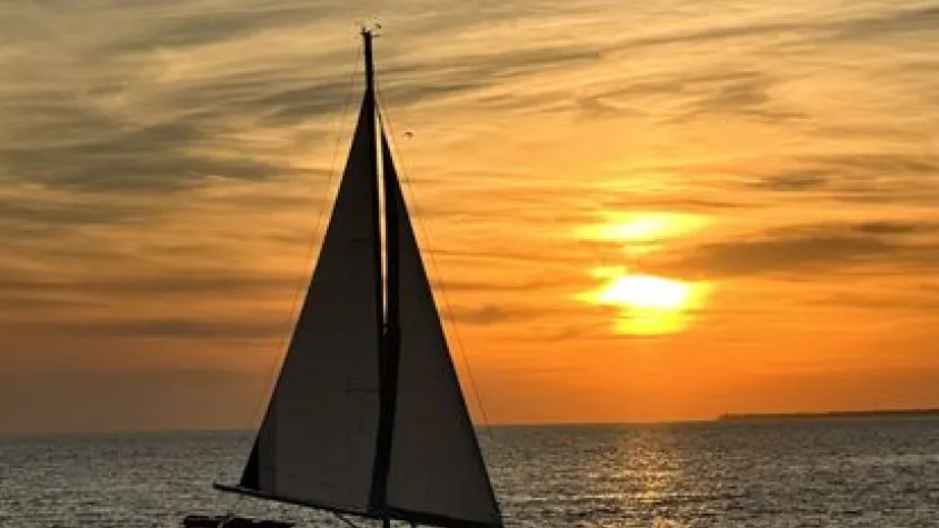 Sunset Sail aboard a modern 38' sailboat.