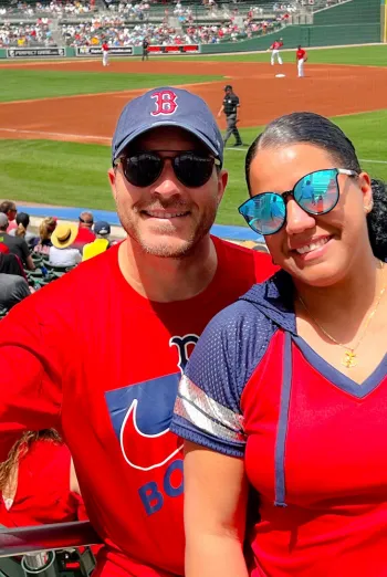 A couple enjoy a Red Sox spring training game.
