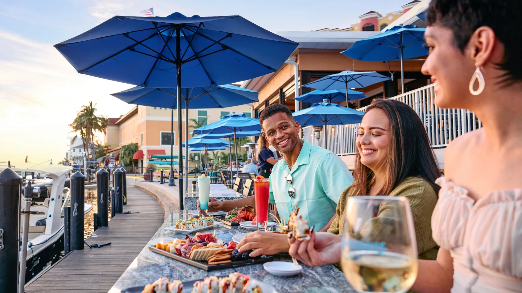 Friends dine on the water
