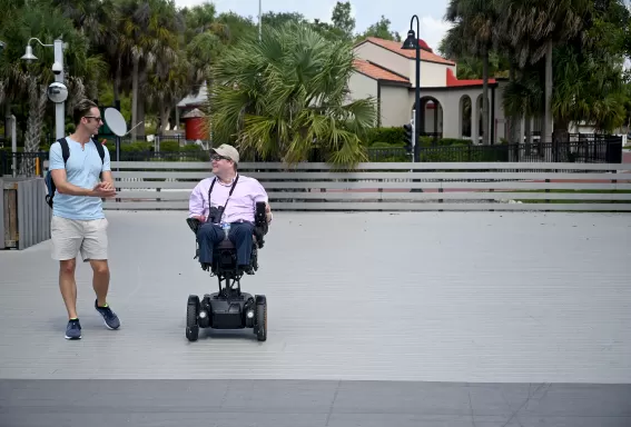 Person using a wheelchair at a park