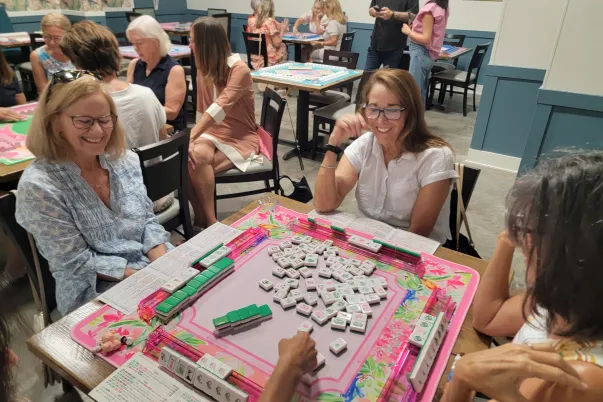 Players enjoying American Mahjong at Sparrow & Palm in Bonita Springs